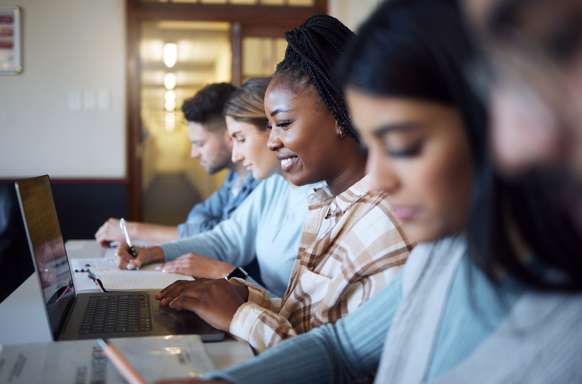 Black woman, education and student with university, study with laptop and research for project in c